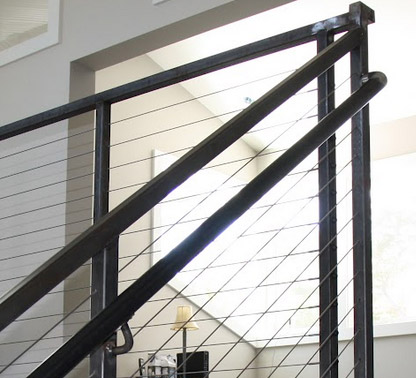 an indoor steel railing system added by our railing installation team