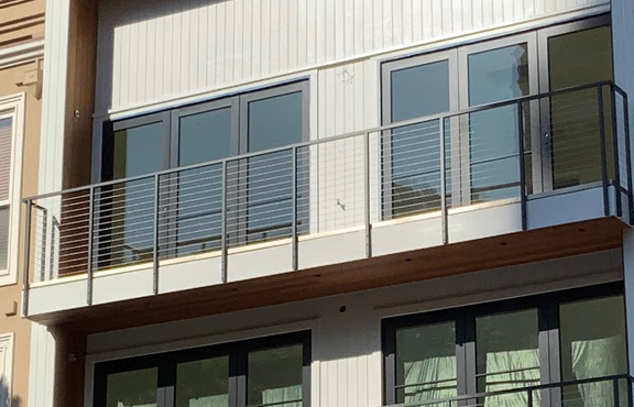 Balcony railings installed by our pros on a commercial property